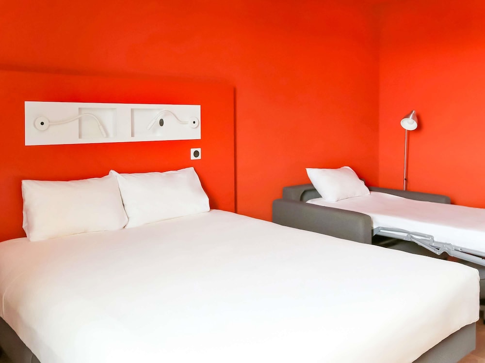 Habitación Familiar del hotel Ibis Budget Saint Genis Pouilly Geneva. Foto 4
