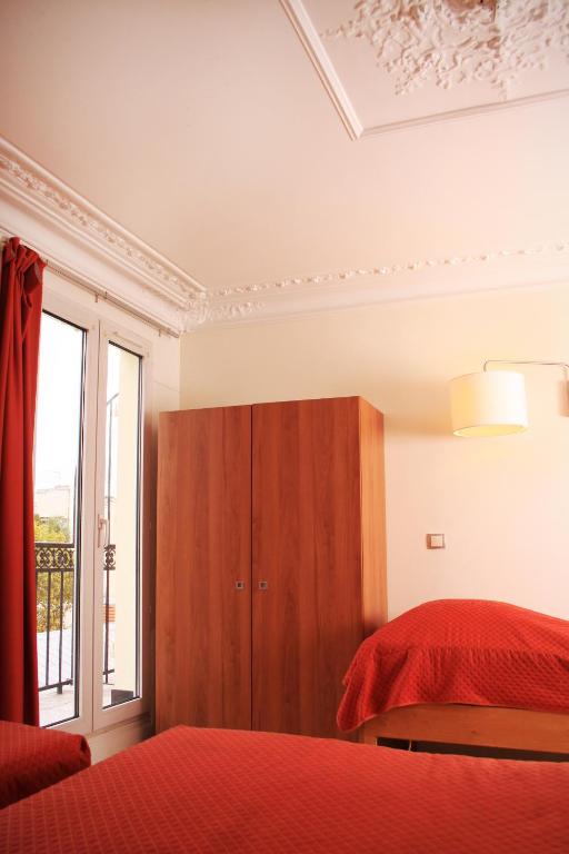 Habitación Cuádruple con aseo privado - Ducha compartida en la planta del hotel Marignan