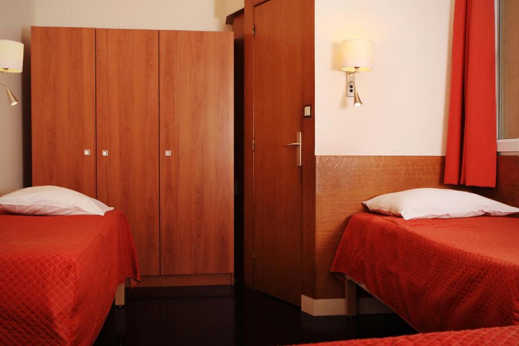 Habitación Cuádruple con aseo privado - Ducha compartida en la planta del hotel Marignan. Foto 1