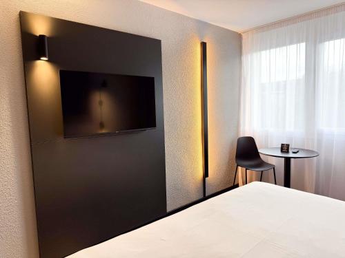 Habitación Standard con dos camas individuales del hotel Ibis Ales Centre Ville. Foto 4