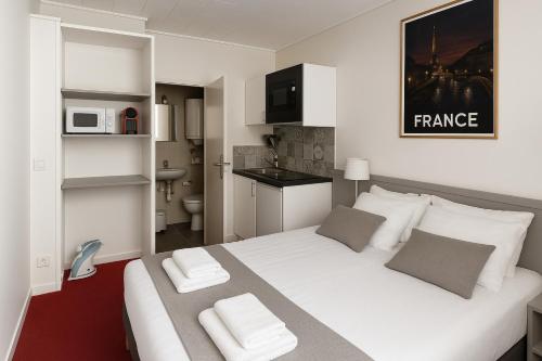 Habitación Doble con zona de cocina del hotel Du Parc Montsouris