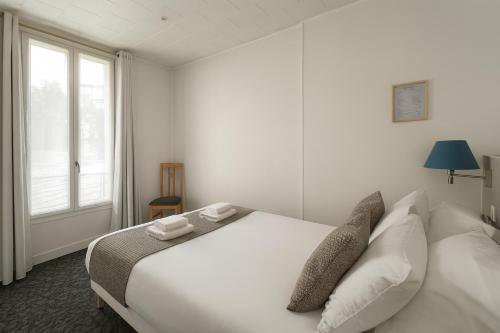 Suite Familiar con cocina americana del hotel Du Parc Montsouris. Foto 5