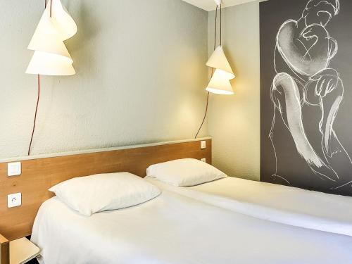 Habitación estándar con dos camas individuales del hotel Ibis Salon De Provence Sud
