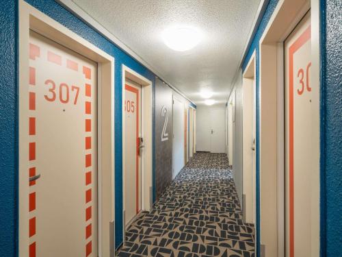 Habitación familiar Normal del hotel Ibis Budget Nantes Sainte Luce. Foto 1