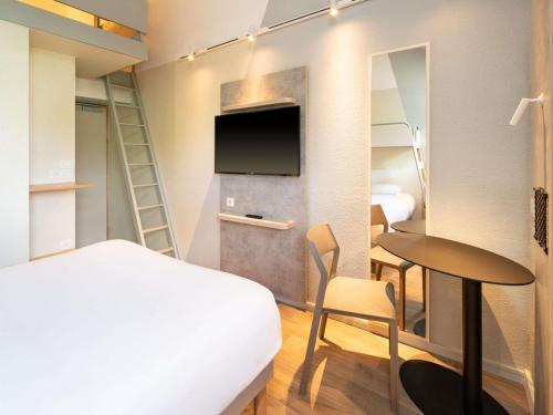 Habitación familiar Normal del hotel Ibis Budget Nantes Sainte Luce. Foto 7
