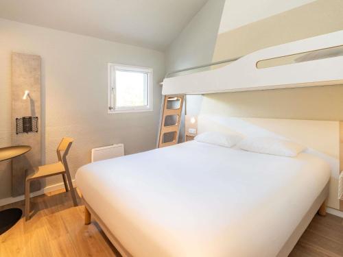 Habitación familiar Normal del hotel Ibis Budget Nantes Sainte Luce. Foto 9