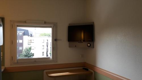 Habitación Triple del hotel Ibis Budget St Gratien - Enghien-les-bains. Foto 7