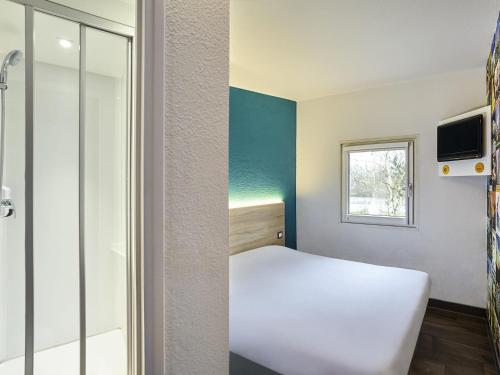 Habitación Cabrio con baño privado del hotel f1 Cholet. Foto 3