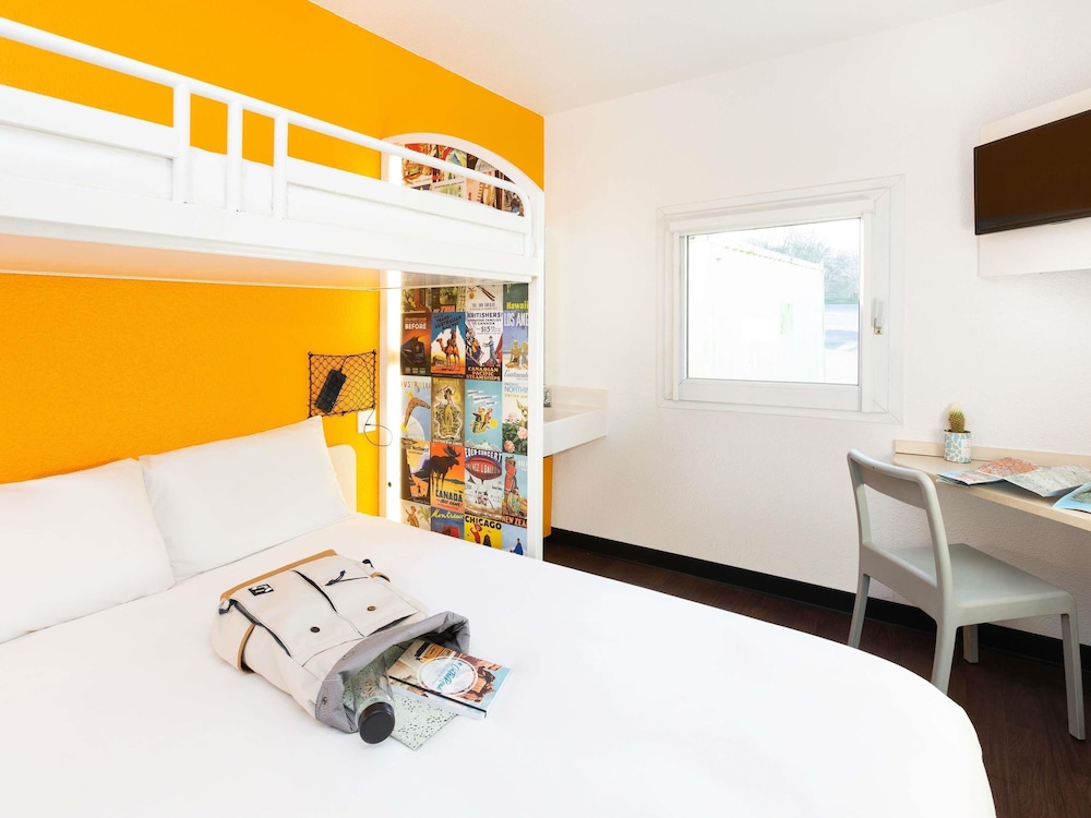 Habitación Break con 1 cama doble y 1 cama en mezzanine, capacidad para hasta 3 personas del hotel f1 Vesoul. Foto 1