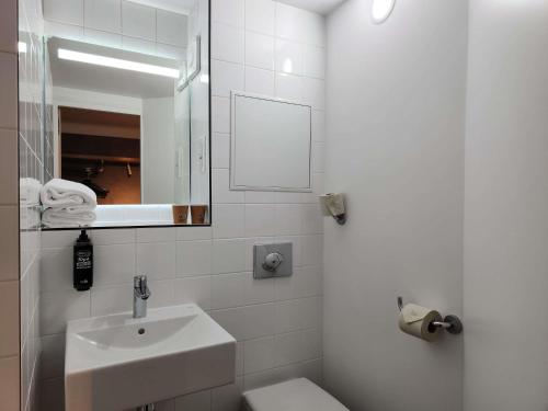 Standard Reboost Room del hotel Ibis Budget Chambourcy Saint Germain. Foto 4