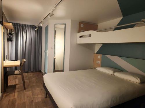 Standard Reboost Room del hotel Ibis Budget Chambourcy Saint Germain. Foto 8