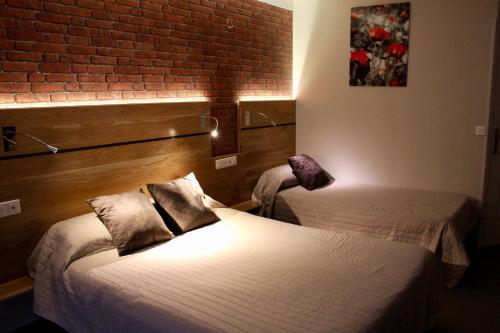Habitación Triple del hotel Hotel Des Pyrénées. Foto 4