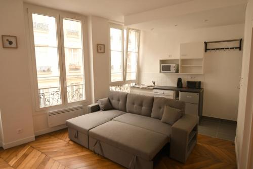Estudio con Sofa Cama del hotel Hotel D'orléans Paris Gare De L'est. Foto 6