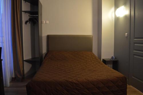 Habitación Triple del hotel Hôtel Alléty. Foto 13