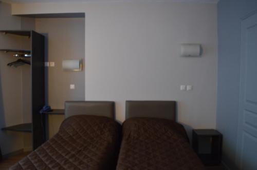 Habitación Triple del hotel Hôtel Alléty. Foto 18