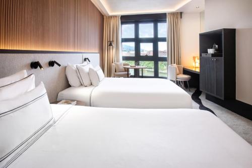 Habitación Familiar del hotel Melia Bilbao. Foto 2
