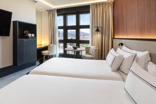 Habitaciones Comunicadas Melia del hotel Melia Bilbao. Foto 6