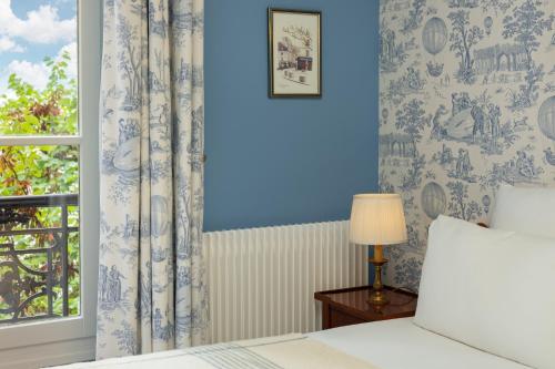 Habitación Doble con vistas al jardín del hotel Des Grandes Ecoles. Foto 9