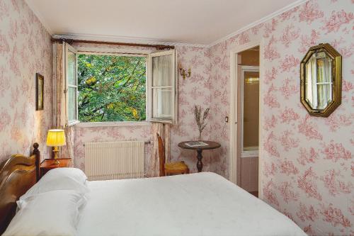 Habitación Doble con vistas al jardín del hotel Des Grandes Ecoles. Foto 10