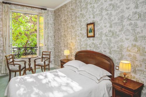 Habitación Doble Superior con vistas al jardín del hotel Des Grandes Ecoles. Foto 1
