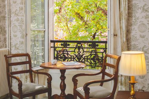Habitación Doble Superior con vistas al jardín del hotel Des Grandes Ecoles. Foto 5