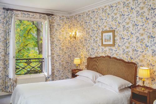 Habitación Doble Superior con vistas al jardín del hotel Des Grandes Ecoles. Foto 8