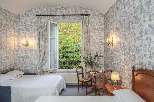 Habitación Familiar del hotel Des Grandes Ecoles. Foto 6