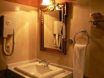 Habitación doble 2 camas del hotel Posada De Vallina By Mira. Foto 6