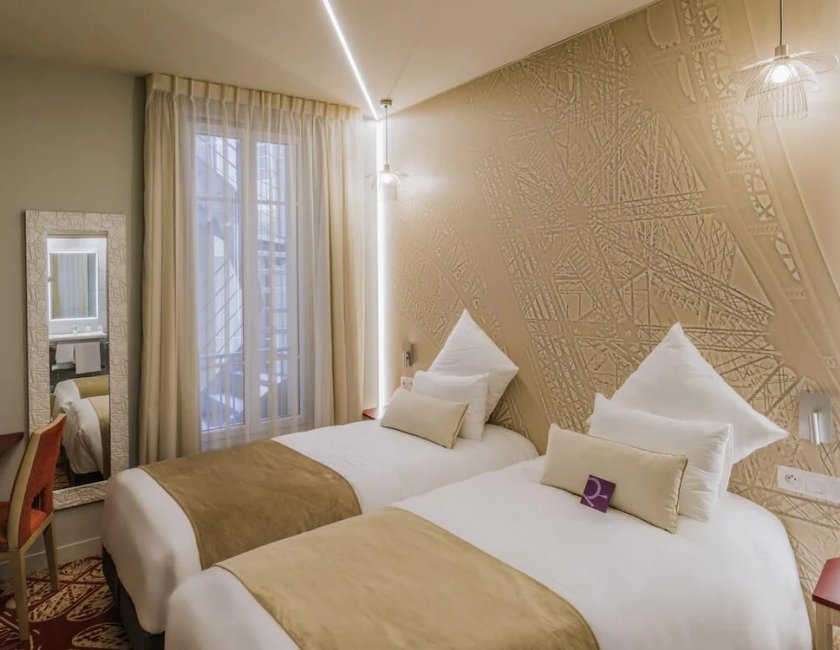 Habitación doble 2 Camas individuales del hotel Mercure Paris Pont De Levallois Neuilly. Foto 1