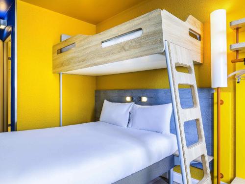 Habitación Triple del hotel Ibis Budget Paris Gennevilliers. Foto 2