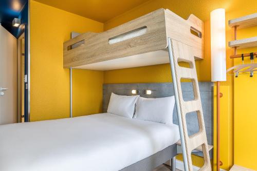 Habitación Triple del hotel Ibis Budget Paris Gennevilliers. Foto 6