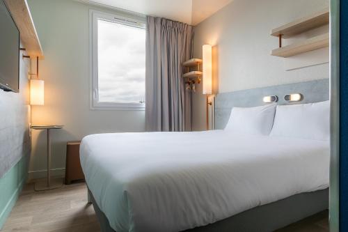Habitación Doble del hotel Ibis Budget Paris Gennevilliers. Foto 8