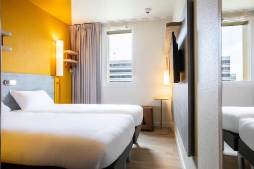 Habitación Doble - 2 camas del hotel Ibis Budget Paris Gennevilliers. Foto 8