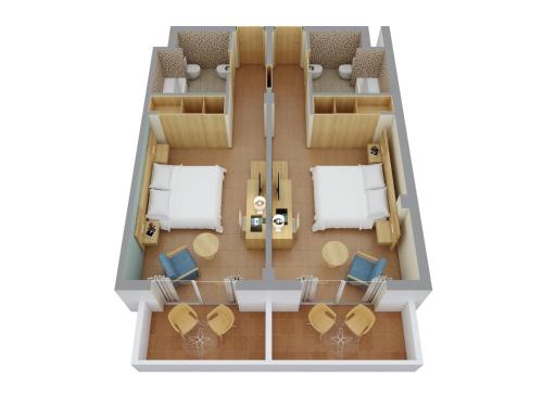 Habitación familiar Familiar 2 Camas individuales 1 Cama doble del hotel Elba Carlota Beach & Golf Resort. Foto 4