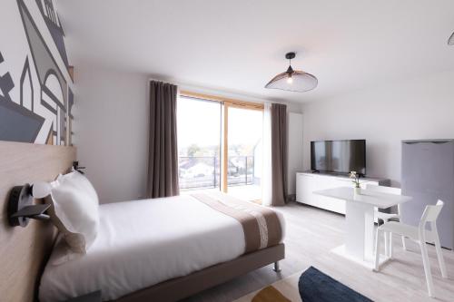 Estudio con terraza del hotel Aparthotel Adagio Bâle Mulhouse Aeroport. Foto 2