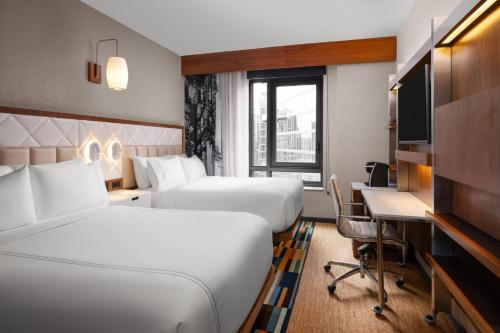 Habitación Doble Estándar con 2 camas dobles del hotel EVEN Hotel New York - Midtown East by IHG. Foto 1