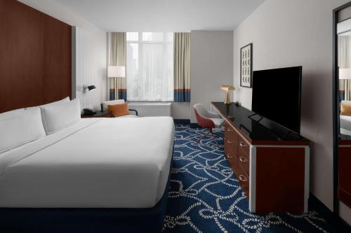 Habitación con cama extragrande - Adaptada para personas de movilidad reducida del hotel Hilton Brooklyn New York. Foto 2