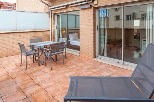 Suite Junior con terraza del hotel Suites Viena Plaza De España. Foto 14