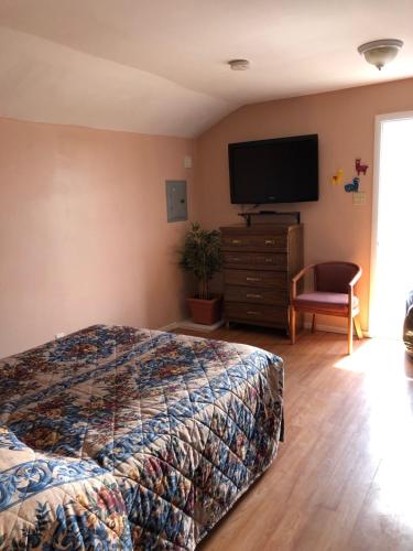 Suite Deluxe con cama Queen del hotel Hillside. Foto 1