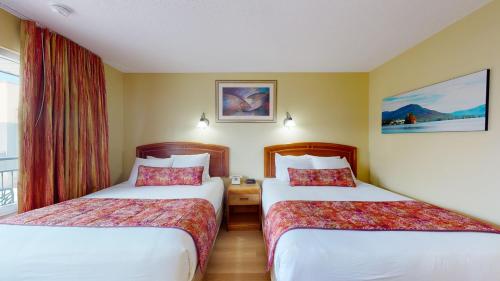 Habitación Estándar con 2 camas grandes - Ala Norte del hotel Surfside On The Lake. Foto 4