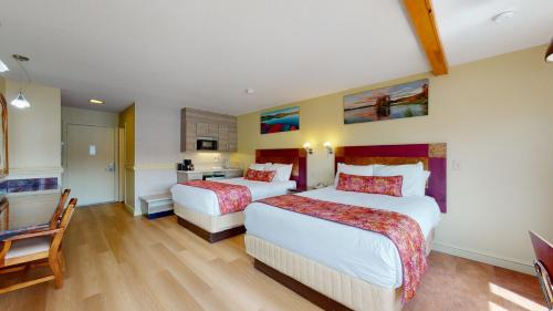 Habitación con 2 camas grandes - Frente al lago del hotel Surfside On The Lake. Foto 2