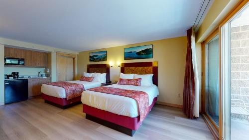 Habitación Superior con 2 camas grandes - Frente al lago del hotel Surfside On The Lake. Foto 3