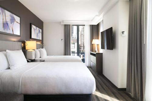 Suite Estudio con 2 camas grandes y cocina del hotel Hyatt House New York/chelsea. Foto 12