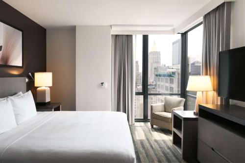 Habitación Den con cama extragrande del hotel Hyatt House New York/chelsea. Foto 4
