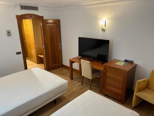 Habitación Doble con Cama supletoria del hotel Gran Liber & Spa. Foto 2