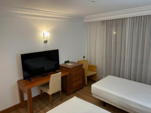 Habitación Doble con Cama supletoria del hotel Gran Liber & Spa. Foto 5