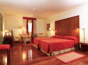 Habitación doble 2 camas del hotel Parador De Limpias. Foto 2