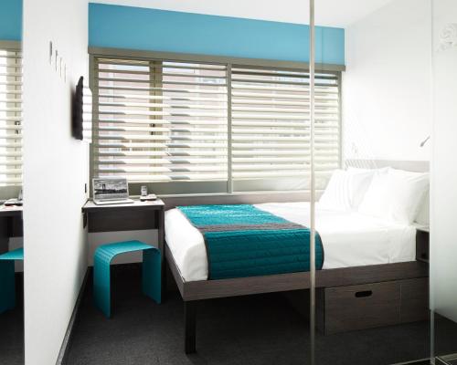 Habitación Pod - Cama doble grande del hotel Pod Brooklyn. Foto 1