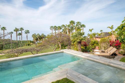 Retiro Solo adultos, Suite de 1 dormitorio con vistas al jardín y piscina privada del hotel The Ritz-carlton Tenerife, Abama. Foto 1