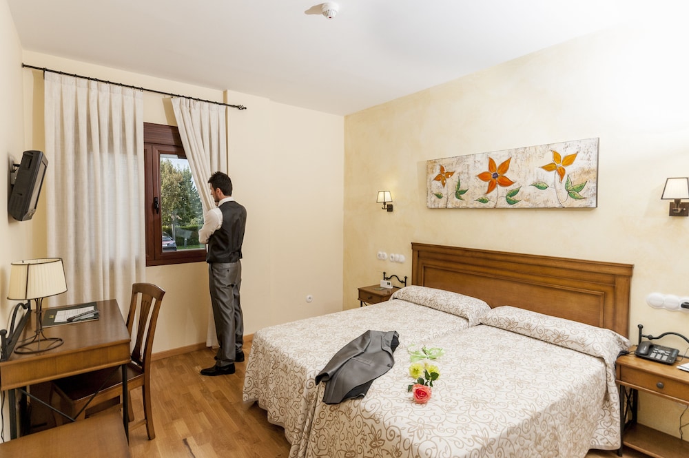 Habitación con 2 camas individuales del hotel Comendador. Foto 1